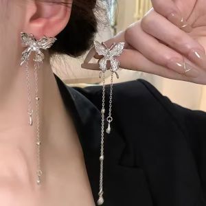 ต่างหูต่างหูแบบหนีบพู่ผีเสื้อโลหะเหลวปีกนางฟ้าเครื่องประดับต่างหูแบบหนีบยาวแบบพังค์ทันสมัย