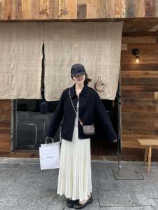 กระโปรงยาวผ่าหน้าทรงหางปลาถักนิตติ้งเนื้อหนาสีขาว Nabi สำหรับผู้หญิงในฤดูใบไม้ร่วงและฤดูหนาว กระโปรงทรงเอเข้ารูปสีพื้น