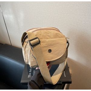 2025 New round Commuter Shoulder Bag Womens Outing Crossbody Bag High Aesthetic Value Versatile Nylon Material Zipper Closure