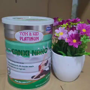 Sữa cho người già ngừa bệnh loãng xương Tom & Kid Platinum Canxi Nano lon 900g giúp xương rắn chắc