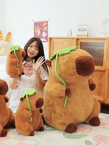 gấu bông chuột lang đeo túi rùa capybara