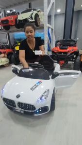 NP TOYs รถแบตเตอรี่เด็ก รถเด็กนั่ง บีเอ็ม2มอเตอร์ เปิดประตูได้ มีไฟหน้า ไฟท้าย No.4026