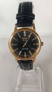 Đồng hồ SEIKO Nữ. Chính hãng  Vỏ mạ vàng . Mặt đá saphia . Dây da đen sang trọng . Hàng mới100%