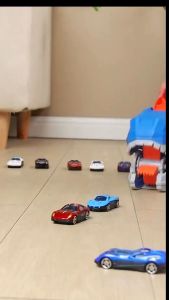 Đồ Chơi Xe Tải Khủng Long Nuốt Xe Con Biến Hình Cầu Trượt Xe Di Động Tặng Kèm Nhiều Xe Ô Tô Hotwheels Dành Cho Bé