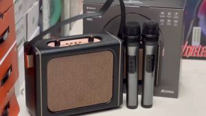 ลำโพงบลูทูธ รุ่นM2006 ฟรีไมค์ลอย2ตัว รองรับAUX TF USB มีสายหิ้วพกพาง่าย เสียงเบสแน่น ปรับเอฟเฟคไมค์ได้ ส่งจากกทม