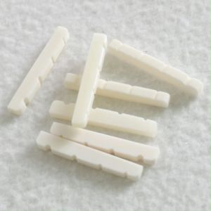1 Pcs Bass Guitar Bass Bone 4 String Bridge Saddle Nut Slotted 38x3.5x5mm guitar accessories