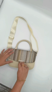 W W.Q.C Sling Bag. This bag features standout styles that are currently trending. Perfect for those looking to add a touch of fashion to their daily outfits