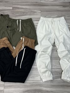 กางเกงกีฬาเอวยางยืดขากว้างสไตล์อเมริกันย้อนยุคสำหรับกลางแจ้งและกลางแจ้งสำหรับฤดูใบไม้ผลิและฤดูร้อน