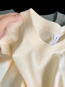 เสื้อยืดคอกลมแขนสั้นสีขาวสำหรับเด็ก ระบายอากาศได้ดี ดูดซับเหงื่อ ทรงหลวม ฤดูร้อน 2025 ใหม่ สำหรับเด็กชายและเด็กหญิง