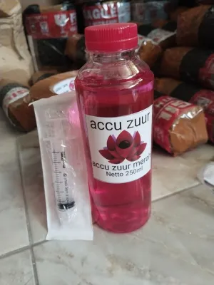 Air accu zuur merah. 250ml air aki kering buat aki yang tekor/drop (bonus suntikan)