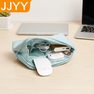 Portable Waterproof Travel Storage Organizer Bag for Power Cords Charging Cables and Cosmetics Pouch Essential Travel Accessory