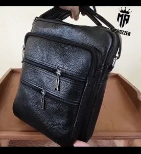 Tas selempang kulit sapi saku banyak tali kulit