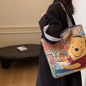 EchoBliss  กระเป๋าผ้าใบลายการ์ตูนกระเป๋าเป้สะพายไหล่ลำลองผู้หญิงความจุใหญ่กระเป๋าโท้ทกระเป๋าถือกระเป๋าปักลาย