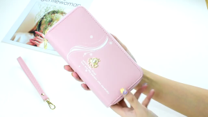 Ví nữ dài cầm tay kiểu dáng mới phối hoạ tiết độc đáo và sành điệu có 2 khóa kéo tiện dụng chất liệu da bền đẹp NEW-0027