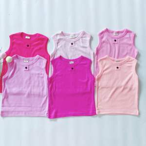 Áo ba lỗ bé trai bé gái phối nút chất cotton xuất dư