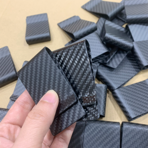ใช้ทุกวันทนทานยอดนิยมหรูหราสีดําคาร์บอนไฟเบอร์ซิมกระเป๋าสตางค์ RIFD คลิปเงินสําหรับผู้ชายผู้หญิง