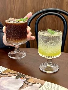 Retro Ins Style High Footed Glass Cup with Embossed Hawthorn Flower Design for Drinks And Juices Elegant Water Cup