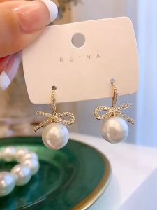 GLAMOR✨Pearl Bow ต่างหูมุกสวยๆ ต่างหูไข่มุก ต่างหูเงินแท้ฝังเพชร ตุ้มหูมุก ต่างหูมุกเกาหลี ต่างหูเพชรประดับมุก ตุ้มหูเพชร ของขวัญให้คนที่รักในวันพิเศษ