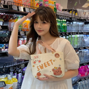 กระเป๋าผ้าใบสำหรับเดินทางขนาดเล็กสำหรับผู้หญิง 2025 รุ่นใหม่ความจุขนาดใหญ่ กระเป๋าถือผ้าใบลายการ์ตูนสำหรับผู้ใช้ที่เดินทาง