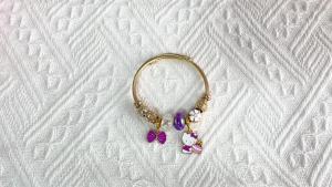Sanrio | Gold Tone Hello Kitty Bangle Zinc Alloy with Blue Kitty Pendant & Flower Beads Adjustable Open Cuff Wristband