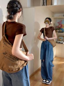 เสื้อยืดคอกลมแขนสั้นผ้าฝ้ายแท้ทรงสลิมฟิตสำหรับผู้หญิง เสื้อชั้นในสีน้ำตาล เสื้อเชิ้ตชั้นในแบบสวมใส่หลายชั้น เสื้อผ้าทำงานสไตล์ยุโรป