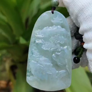 Natural Old Mine Type A Jadeite Pendent Carved with scenery with NGI Gemstone report weighs 285.62 grams 68.51 * 39.18 * 12.33 mm - Good Translucency with 3.34 Specific Gravity - Near Colorless with greenish blue patches pendant (pendant148)