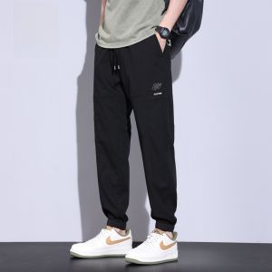 ROMON | Quần dài công sở nam mùa hè mỏng thời trang Harajuku rộng rãi co giãn thể thao quần dài thường ngày cạp vừa quần dài công sở