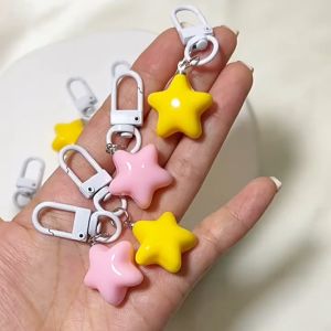 พวงกุญแจ จี้รูปดาวน่ารัก สีเหลือง สีชมพู สําหรับห้อยกระเป๋าเป้สะพายหลัง หูฟัง
