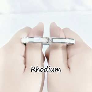 SO SEOUL Claire Mother of Pearl Encrusted with Austrian Crystal Rhodium/Rose Gold Side Hinged Bangle