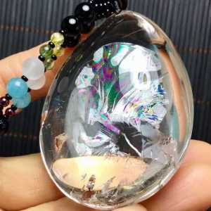 All-natural fully-enclosed multi-color gemstone pendant ✨💎 Pure white body exquisite craftsmanship hand-polished by pure hands. Purely natural formation natural gemstone flowers inside the crystal form multi-colors with a full shape.