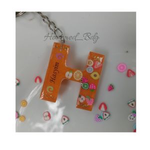 gantungan terbaru orange metalik motif buah aksesoris tas termurah