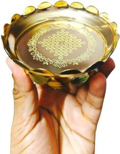 Gold decorative plate with lotus edge and geometric design