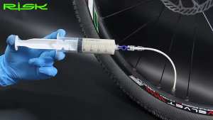 Dụng cụ tool bơm keo tự vá xe đạp cho lốp vỏ Tubeless RISK