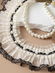 ผ้าบังลมหน้าต่างผ้าลูกไม้สีขาวเทาพร้อมขอบลูกไม้สไตล์หอคอยสองชั้นพร้อมขอบคลื่นสีบล็อกตกแต่ง