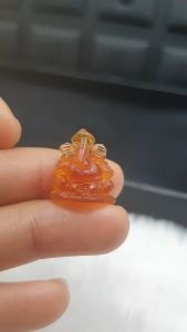 J389 อำพันพม่าแท้ จากเมืองคะฉิ่น งานแกะพระพิฆเนศ เนื้อโปร่งแสง