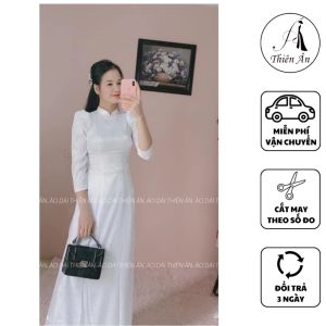 Áo dài gấm tơ mềm màu trắng vai bồng tay lỡ