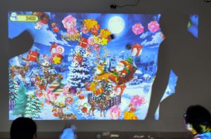 Interactive Wall Projection Game System with Smart Sensors for Multi-player Indoor Commercial and School Sports Venues