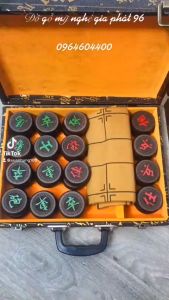 Bộ Cờ Tướng Làm Từ Gỗ Trắc Đen Và Quà Tặng Bàn Vải Da Cao Cấp