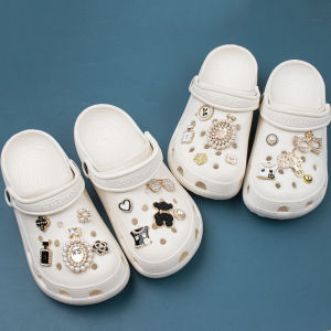 Luxurious Style Crocs Jibbitz Charms & Accessories\\n\\n Introduction to Luxurious Style Crocs Jibbitz Charms & Accessories\\n\\nCrocs Jibbitz charms and accessories have gained immense popularity among shoe enthusiasts, offering a unique way to personalize and enhance their footwear. These charms are available in various styles and designs, such as the Flower Removable Shoe Buckle, Crystal Diamond Clogs Decoration, and Decorative Bear Set Shoes. They are made from high-quality materials like alloy and crystal diamond, ensuring non-toxic and safety standards.\\n\\n Key Features & Benefits\\n\\nThe key features of Crocs Jibbitz charms include their ability to make shoes more fun and unique. They are easy to attach and remove, allowing users to switch up their style effortlessly. Moreover, these charms are suitable for various types of shoes, including boots, sandals, casual shoes, thermal shoes, cloth shoes, work shoes, slippers, and more.\\n\\n Materials & Safety\\n\\nCrocs Jibbitz charms are made from high-quality alloy and crystal diamond materials, which are non-toxic and safe for use. These materials ensure durability and longevity, making them a great investment for shoe enthusiasts.\\n\\n How to Choose the Right Crocs Jibbitz Charms & Accessories\\n\\nChoosing the right Crocs Jibbitz charms depends on two factors: identifying your shoe type and selecting the perfect charm or accessory.\\n\\n Identifying Your Shoe Type\\n\\nBefore purchasing any Crocs Jibbitz charms, it's essential to identify the type of shoe you want to decorate. This will help you choose the right charm or accessory that complements your shoe style.\\n\\n Selecting the Perfect Charm or Accessory\\n\\nOnce you've identified your shoe type, you can choose the perfect charm or accessory that aligns with your personal style. Some popular options include the Flower Removable Shoe Buckle, Crystal Diamond Clogs Decoration, and Decorative Bear Set Shoes.\\n\\n Enhancing Your Shoe's Appearance with Crocs Jibbitz Charms & Accessories\\n\\nCrocs Jibbitz charms offer endless possibilities for enhancing your shoe's appearance. Here are some popular options:\\n\\n Flower Removable Shoe Buckle\\n\\nThe Flower Removable Shoe Buckle is a popular choice among Crocs Jibbitz charm enthusiasts. It adds a touch of elegance and sophistication to any shoe, making it perfect for formal occasions.\\n\\n Crystal Diamond Clogs Decoration\\n\\nThe Crystal Diamond Clogs Decoration is another popular option that adds a touch of glamour and sparkle to your shoes. It's perfect for special events and occasions where you want to make a statement.\\n\\n Decorative Bear Set Shoes\\n\\nThe Decorative Bear Set Shoes are a fun and playful option that adds a cute and whimsical touch to your shoes. They're perfect for casual wear and everyday use.\\n\\n Conclusion & Final Thoughts\\n\\nIn conclusion, Crocs Jibbitz charms and accessories offer endless possibilities for personalizing and enhancing your shoes. With a wide range of styles and designs available, there's something for everyone. Whether you prefer a touch of elegance, glamour, or playfulness, Crocs Jibbitz charms have got you covered. So why not add some fun and uniqueness to your shoes today?\n}