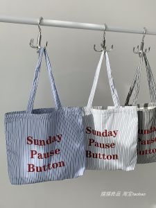 กระเป๋าผ้าใบลายทางยูนิเซ็กซ์ความจุขนาดใหญ่สำหรับเดินทาง Sunday ปี 2025 กระเป๋าสะพายไหล่แบบลำลองสำหรับเยาวชนในฤดูใบไม้ร่วง