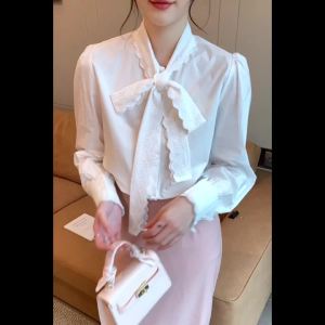 AMMIN 2025 Spring and Autumn new French V-neck sweet embroidery hollow lace bow ribbon design long sleeve commuter cotton shirt woman simple solid color elegant blouse