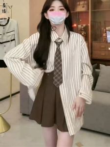 เสื้อเชิ้ตคอโปโลลายทางย้อนยุค ผู้หญิง หลวม แขนยาว ฤดูใบไม้ร่วง ฤดูหนาว พลัสไซส์ สไตล์เกาหลี เสื้อเชิ้ตสไตล์วิทยาลัย พรางหุ่น