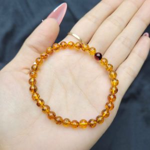 Vòng Hổ Phách Hoa Baltic - Phong Thủy TUDO