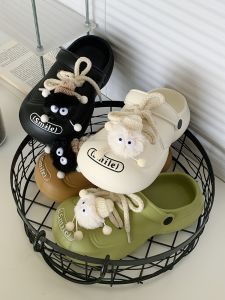 Cute Couple Plushy Black White Coal Ball Hole Hole Summer Beach Sandals for Men And Women Cartoon Korean Style Flat Bottom EVA Shoes