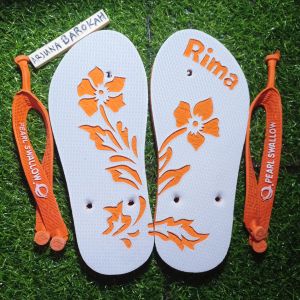 Sendal swallow bermotif gambar sandal ukiran suwallow