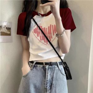 เสื้อทีเชิ้ตแขนสั้นไหล่ตรงสีชมพูเสื้อตัวบนแบบสั้นเข้ารูปสำหรับคนตัวเล็กสาวแซ่บสุดเท่หวานใส่คู่กับสาวโดมอนสำหรับฤดูร้อน