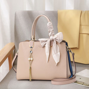 Aidrani Genuine leather womens handbag 100% soft cowhide with metal tassel design as accessories