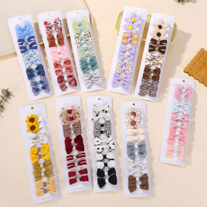 10 ชิ้น/เซ็ตเด็กประณีตคลิปผมน่ารัก Bowknot พิมพ์ผ้า Hairgripes สําหรับสาวบูติกอุปกรณ์เสริมผม