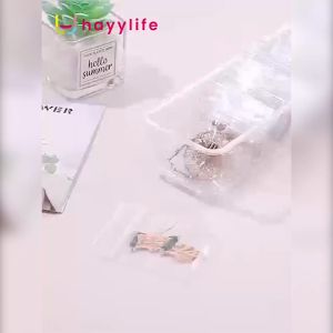 HAYYLIFE Tas Penyimpanan Perhiasan Cincin / Kalung / Gelang / Anting Portable Bahan PVC Transparan Anti Oksidan / Debu- Buku Penyimpanan Perhiasan Kalung Anting Tahan Debu Perhiasan Penyimpanan Buku segel Transparan HL-AGB770