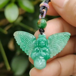 Green Jadeite carved as Angel (Front) and Cross (back) Natural Type A Jadeite pendant with NGI Gemstone report weight 6.33 gram 35.39 * 23.76 * 5.61 mm with Translucent fine grain crystal aggregate granular and fibrous interlocking texture (pendant139)